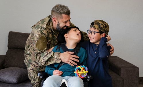 military father with two sons; one of who has a disability