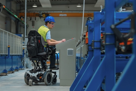 working employee in a wheelchair