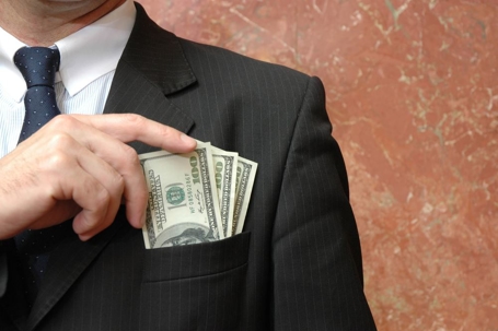 man with money in his pocket