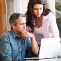 couple looking at laptop