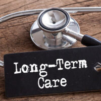 long term care sign with a stethoscope